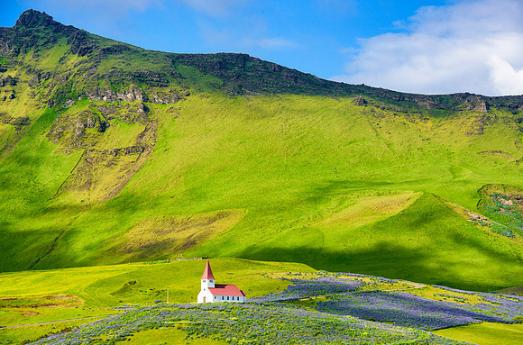 Church in green mountain landscape Vik Iceland Europe by Matthias Hauser hauserfoto.com