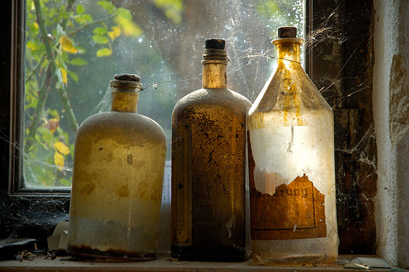 Nostalgia - old and dusty glass bottles
