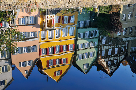 Water reflection in river Neckar - Old houses in Tübingen Tuebingen Germany